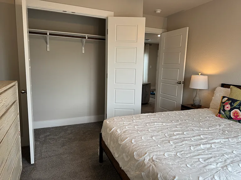 Bedroom 2 (Queen bed), spacious closet. In-room bathroom