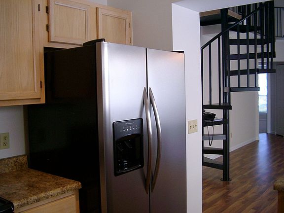 Kitchen opens to great room with loft