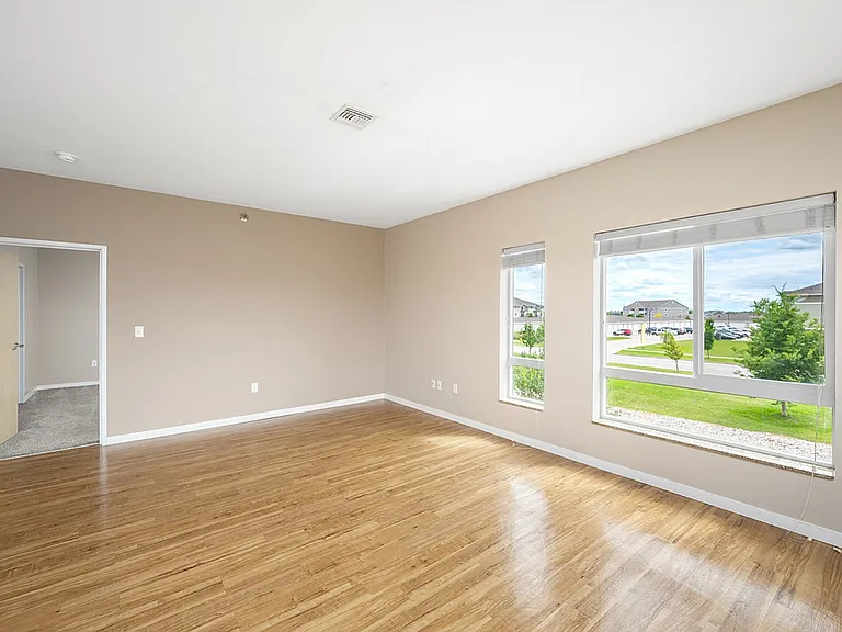 4. Stone Creek F - Living Room_Reverse