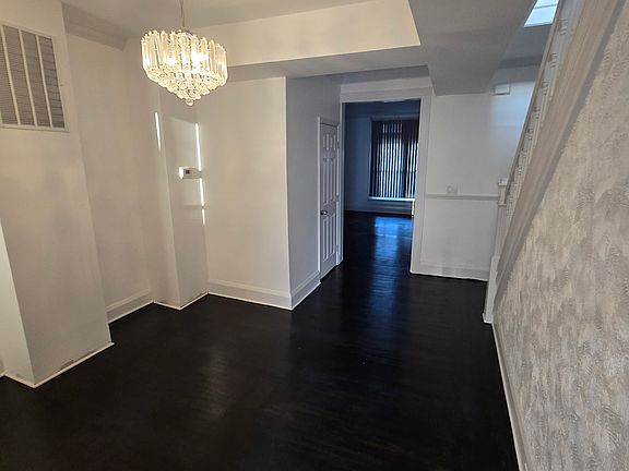 Dining Room opens to Living Room with 1/2 Bathroom