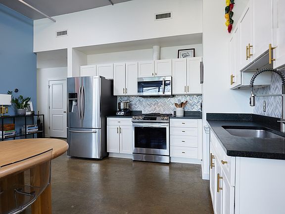 Updated fridge with water filter, new gas stove and oven, and new microwave.