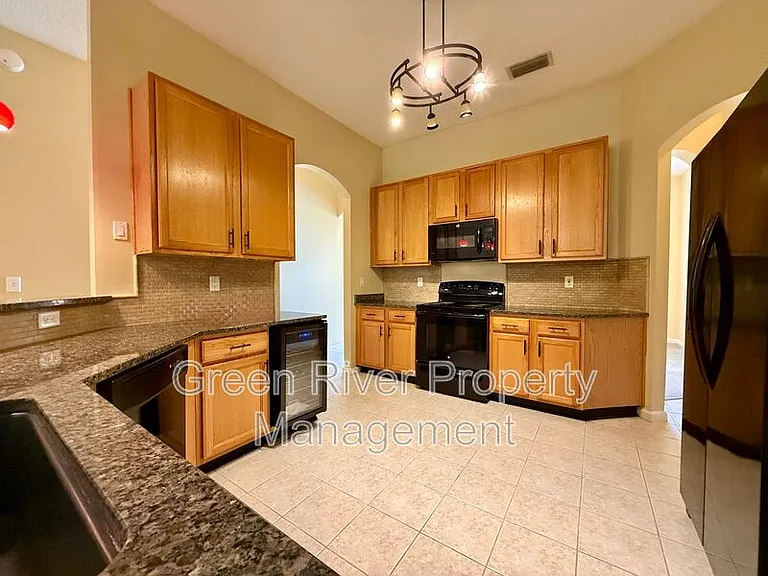 8716 Canopy Oaks Dr — Photo 12