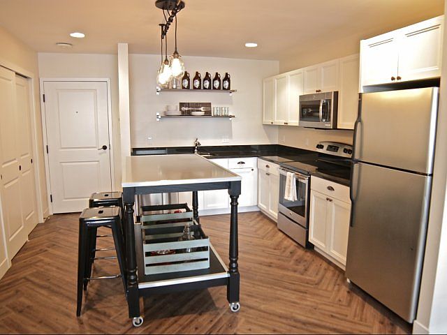 Custom roll-away kitchen island