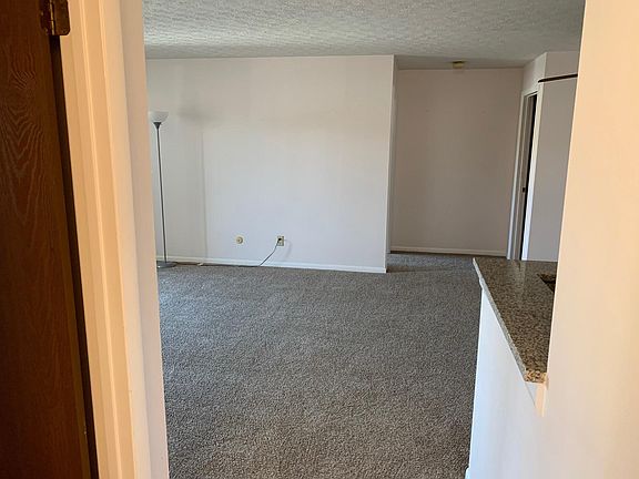 As you walk into 2241 E- coat closet on right, first bedroom on left. Living room straight ahead