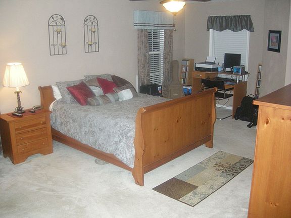 Master suite with two walk-in closets and alcove