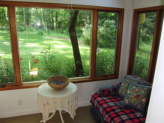 Rear entry sun room overlooking back yard