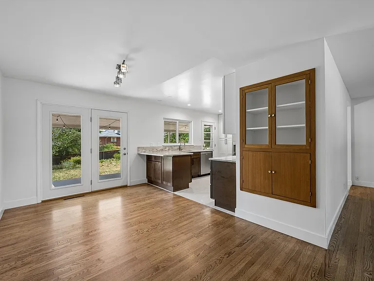 Easy access from kitchen and dining to huge backyard and covered porch