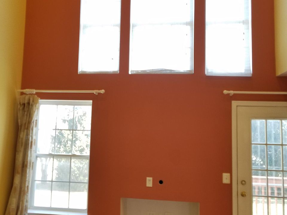 Plentiful naturally light two story family room.