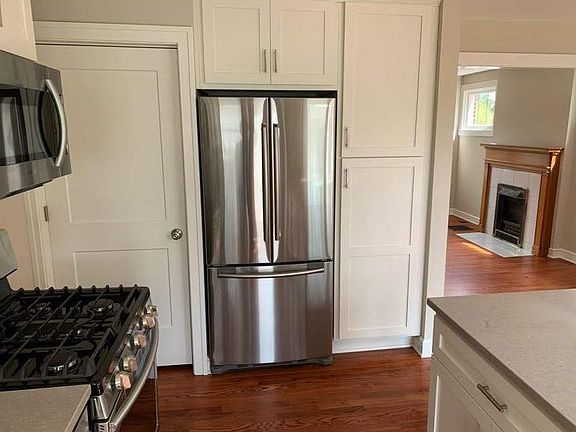 Open kitchen, door on left goes to basement