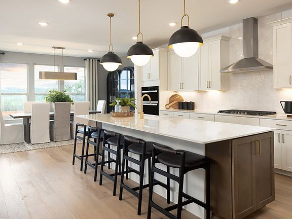 Kitchen with Eat-In Island Overlooking the Dining Area