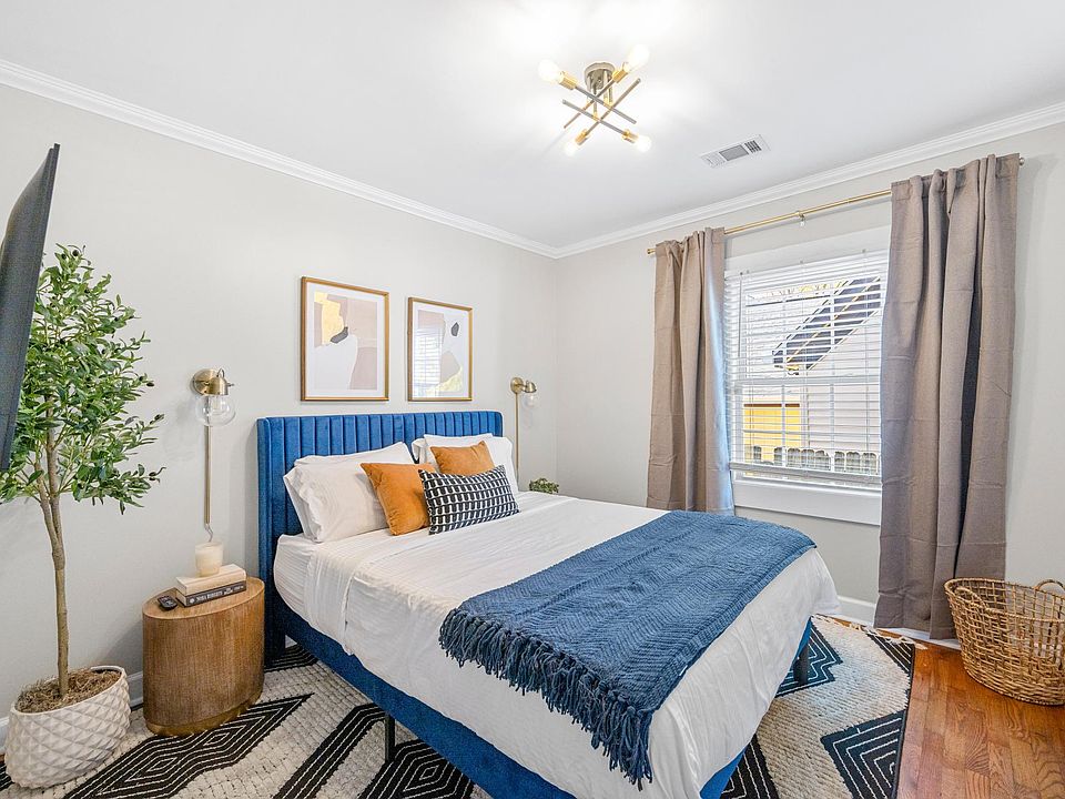 This room features a 43" Roku TV and a small closet, providing convenient storage solutions without compromising on aesthetics. Close the blackout curtains before jumping into the queen-sized bed for ultimate relaxation.