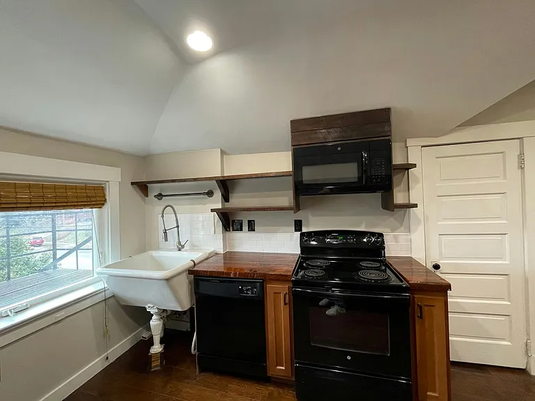 Equipped with dishwasher, oven, range, and microwave