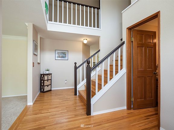 Two-story entry with half-bath>