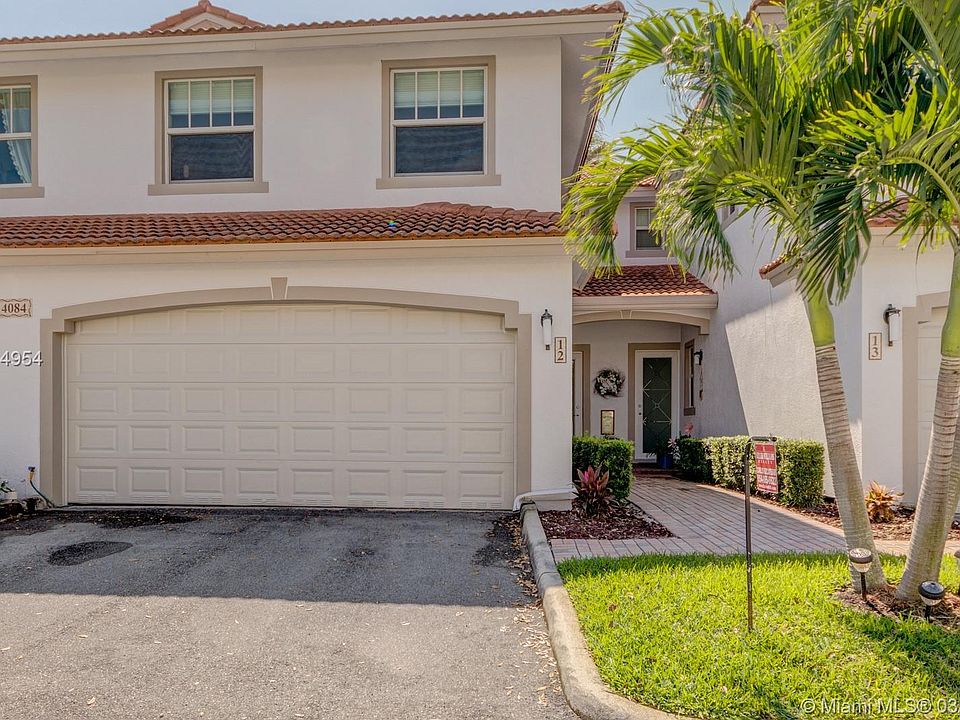 1st image of 4084 W Palm Aire Dr APT 12