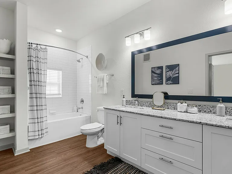Step into this elegant bathroom, where modern design meets serene comfort.