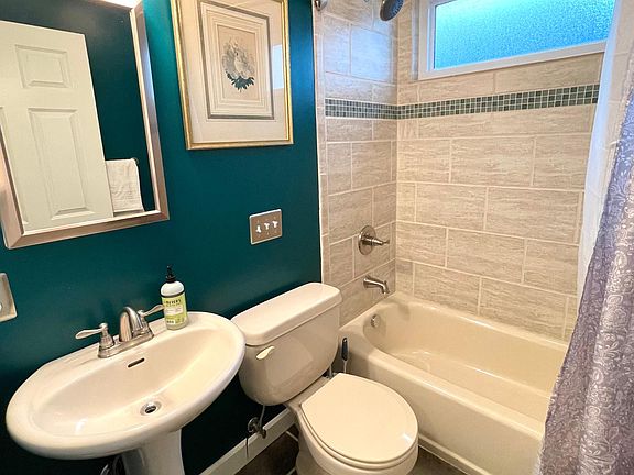 Full first-floor bathroom with shower/tub combination