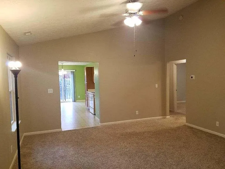 Living room with vaulted ceiling