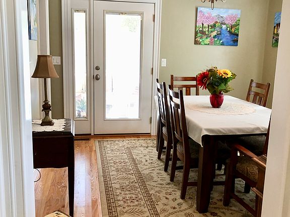 Dining room with door to por