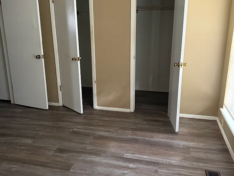 Primary Bedroom with walk-in closet and attached bath