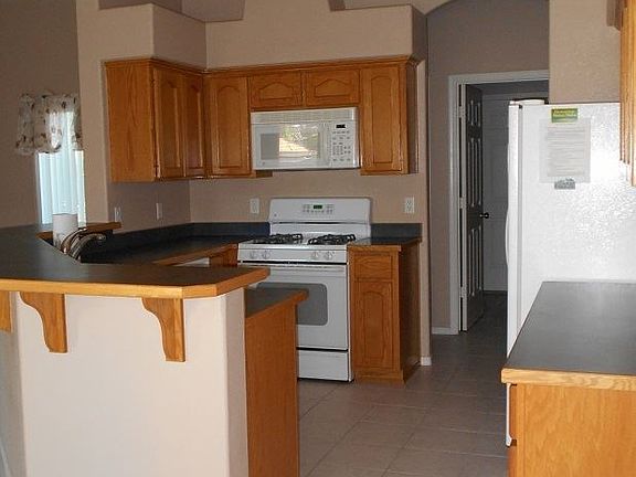 4th image of 10764 E 39th Ln