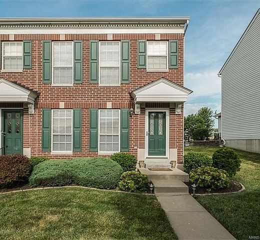 Charming neighborhood with lots of common ground, wrought iron mailboxes and pretty front doors.