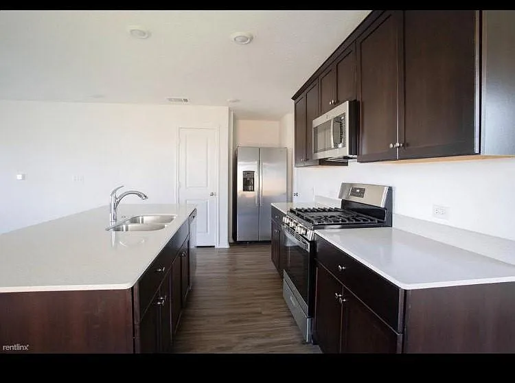 7129 Dancing Wind Ln — Photo 10