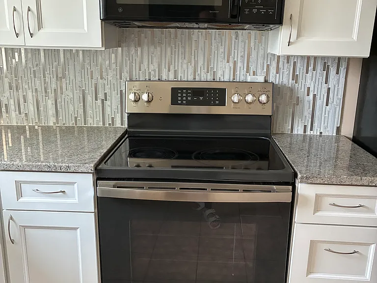 Gas cooking, microwave and granite countertops