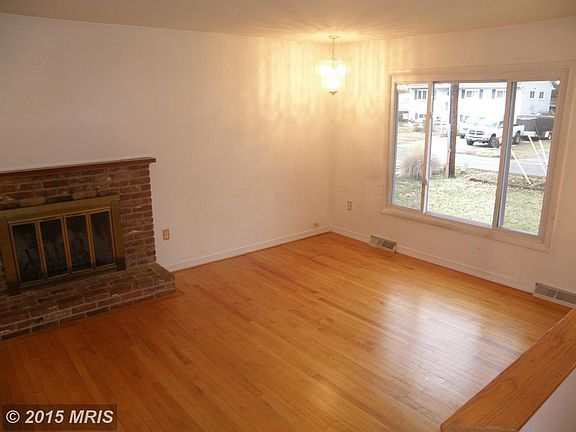 Living Room with Fireplace & Hardwood Floors