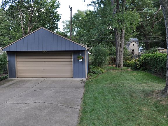 Large Backyard with Mature Trees and Perennial Gardens