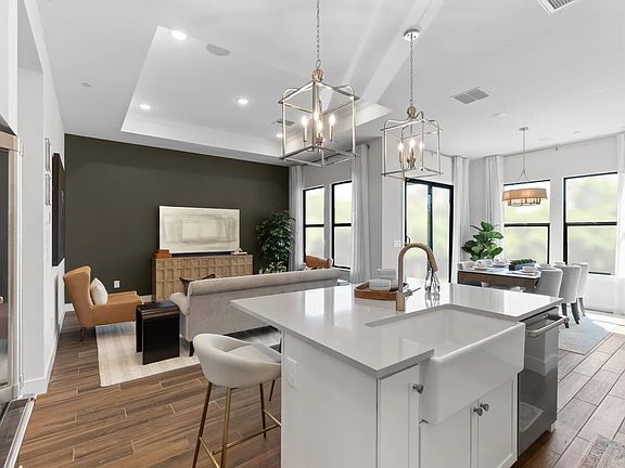 Kitchen with pendant lighting overlooking great room