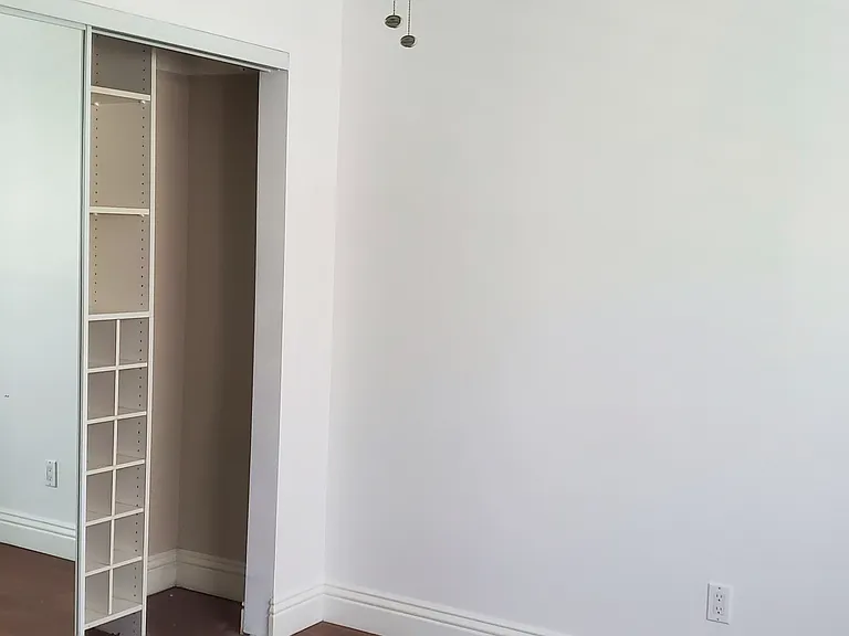 One of the bedrooms, with spacious closet space