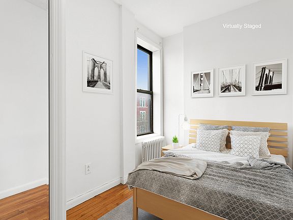 4th image of 242 E 10th St APT 23