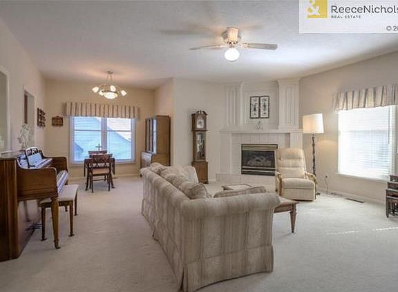 The spacious Living Room/Dining Room is the perfect place to visit with family and guests.  The corner fireplace is operated with the flip of a switch for convenience.