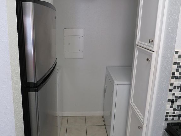 Kitchen includes all stainless steel appliances. New washer and dryer in laundry room.