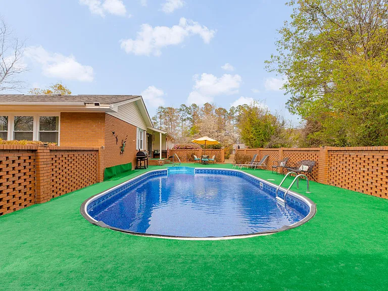 Outdoor Pool area w/Salt water pool & spacious hangout spots