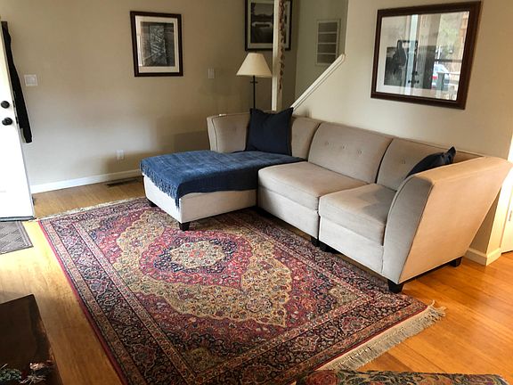 Living Room Couch and TV included.