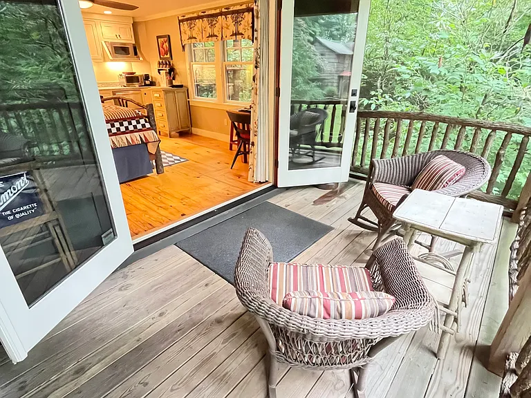 The view from the private screen porch into the apartment.