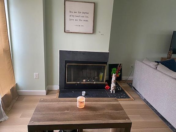 entry way fireplace and living area.