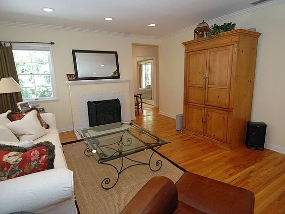 Living Room with Brick Fireplace