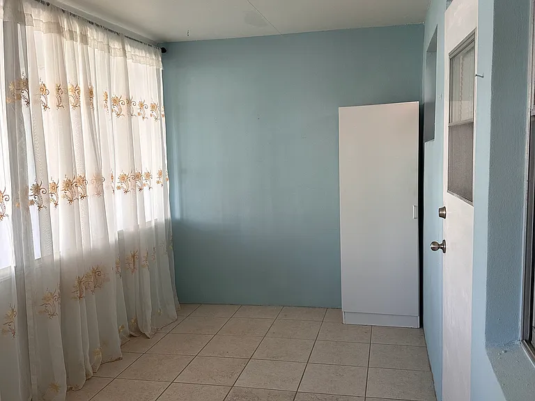 Enclosed porch.
