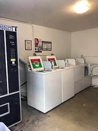 Laundry room conveniently adjacent to unit.