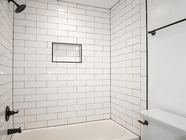 Updated Bathroom with Subway Tile Shower