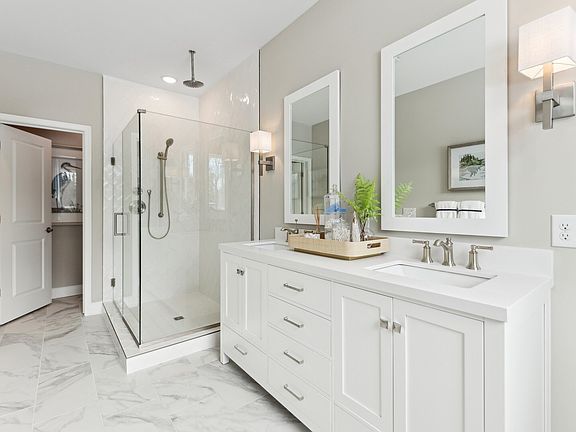 Primary bath with glass-shower enclosure