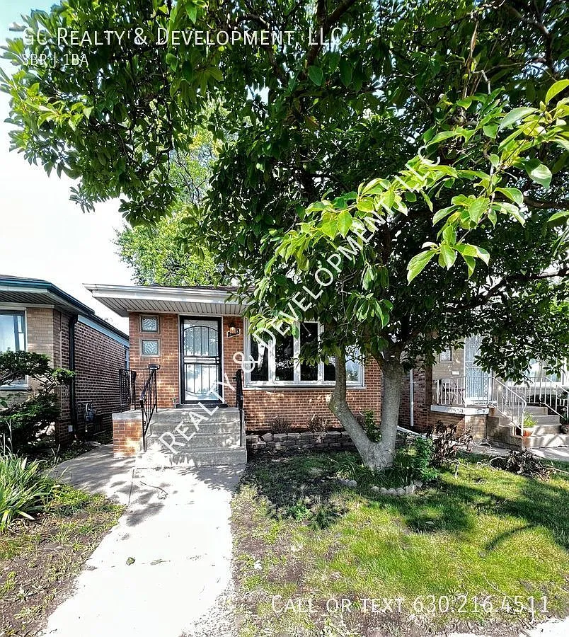 10238 S Torrence Ave photo 1