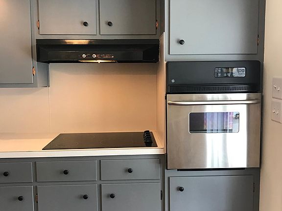 Flat top stove. Entrance door to the right direct from carpo