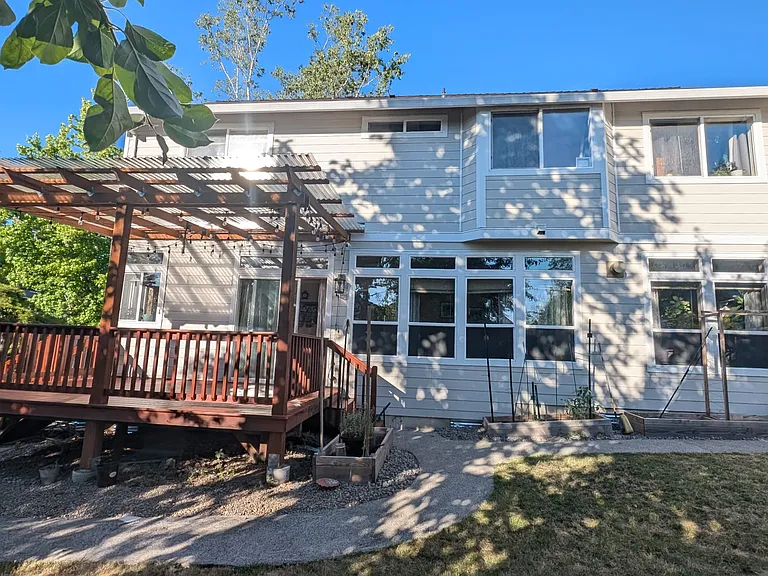 back of the house, attached covered deck