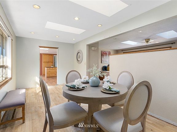 Bathed in natural light, the formal dining area is conveniently accessible off the kitchen. 