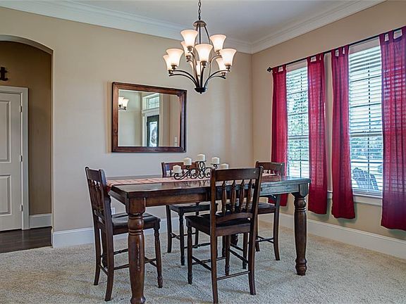 The formal dining features natural light, updated light fixtures, and has plenty room for your over sized dining room table.