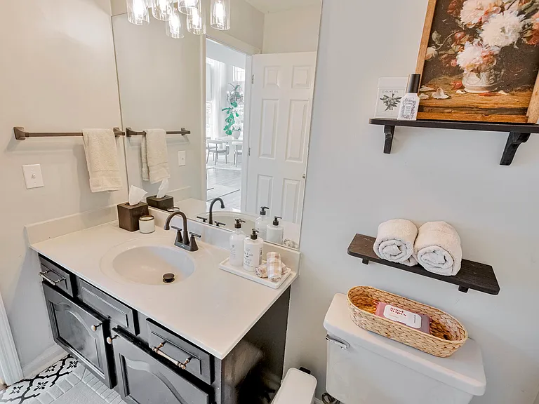 Half bathroom located next to living room on main floor