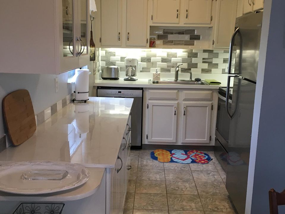 Kitchen with Loads of cabinets and prep area